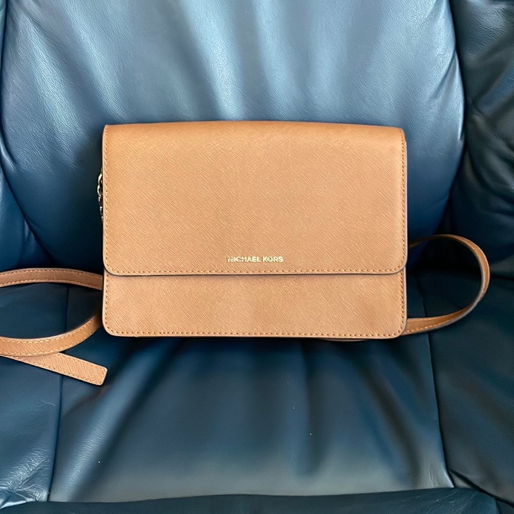 Leather Michael Kors crossbody bag.